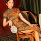 Yellow Chinese short-sleeved cheongsam. Retro cheongsam.