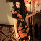 Elegant floral cheongsam. Chinese Qipao dress.