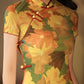 Elegant Chinese vintage cheongsam. Yellow floral qipao dress. Sleeveless gown.