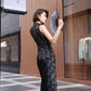 Black Tang suit dress. Waistcoat and skirt two-piece set.