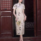 Traditional short-sleeved cheongsam. Floral cheongsam.