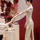 White cheongsam. Bridal dress. wedding dress.