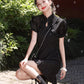 Black cheongsam. Short sleeve cheongsam. Black skirt.