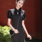 Black cheongsam. Short sleeve cheongsam. Black skirt.