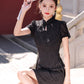 Black cheongsam. Short sleeve cheongsam. Black skirt.