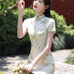 Green cheongsam. Short sleeve cheongsam. Green dress.