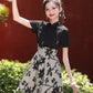 Black cheongsam. Short sleeve cheongsam. Black skirt.