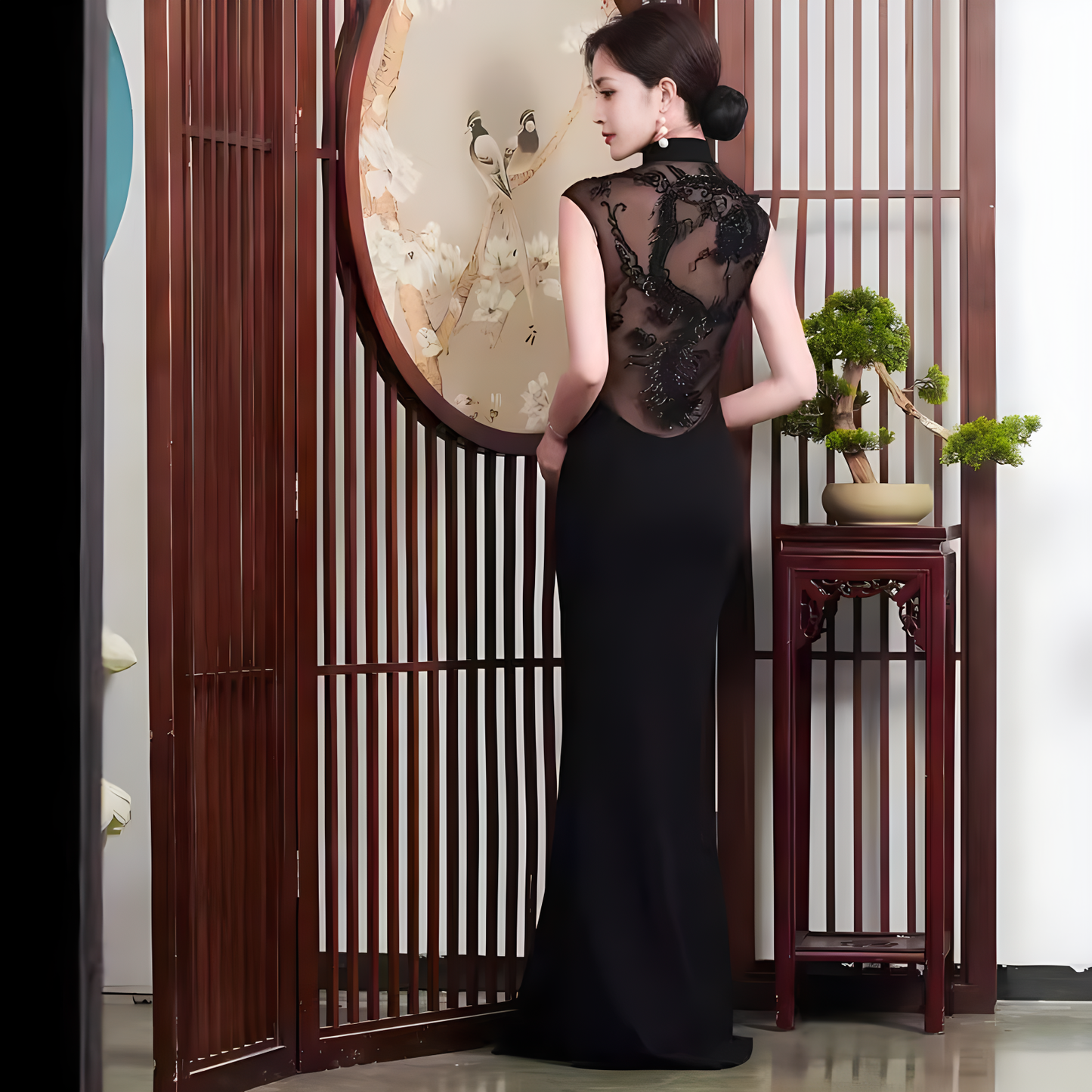 Black openback cheongsam dress.