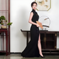 Black openback cheongsam dress.