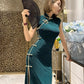 Green sleeveless cheongsam.