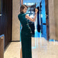 Green sleeveless cheongsam.