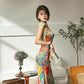 Floral cheongsam. Long skirt with short sleeves.