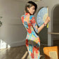 Floral cheongsam. Long sleeve maxi dress.