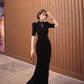 Black cheongsam. Chinese style long skirt. Chinese dress.