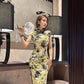 Yellow cheongsam. Floral short-sleeved cheongsam.