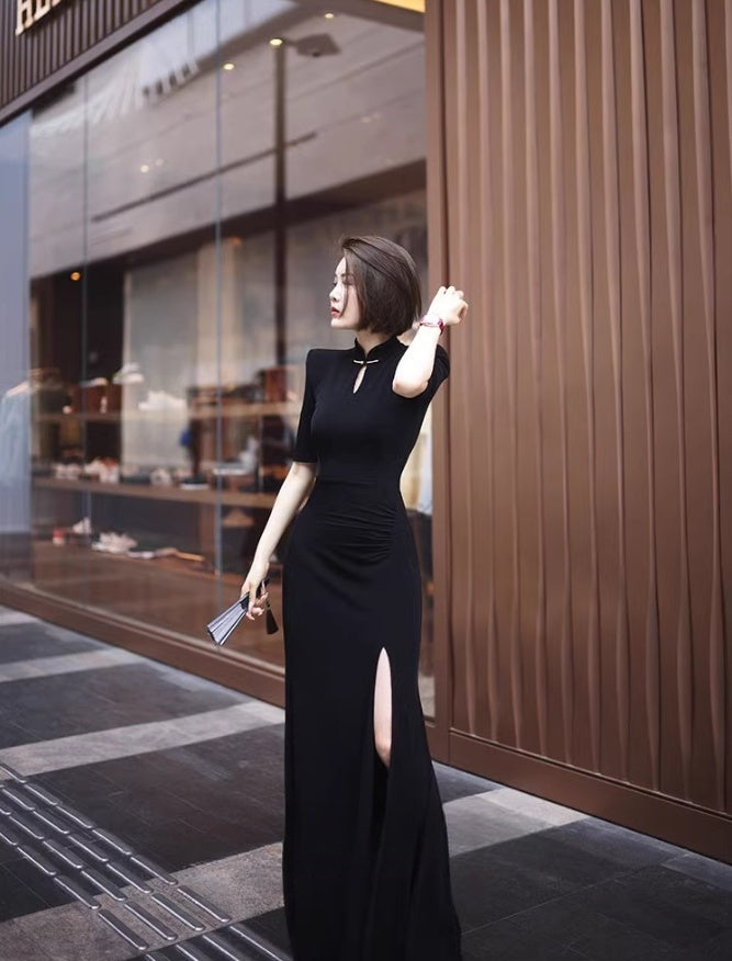 Black cheongsam. Chinese style long skirt. Chinese dress.