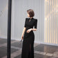 Black cheongsam. Chinese style long skirt. Chinese dress.