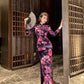 Black floral cheongsam. Long sleeve gown.