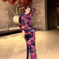 Black floral cheongsam. Long sleeve gown.