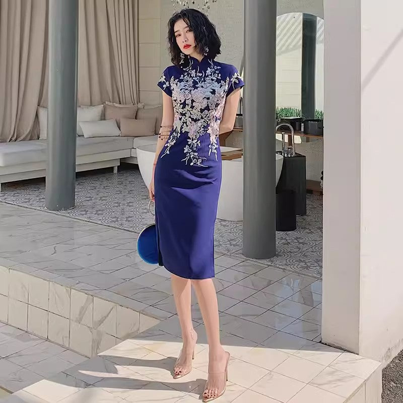 Blue embroidered cheongsam. Elegant ball gown.