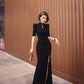 Black cheongsam. Chinese style long skirt. Chinese dress.