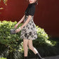 Black cheongsam. Short sleeve cheongsam. Black skirt.