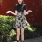 Black cheongsam. Short sleeve cheongsam. Black skirt.