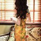 Elegant Chinese vintage cheongsam. Yellow floral qipao dress. Sleeveless gown.