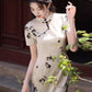 Traditional short-sleeved cheongsam. Floral cheongsam.