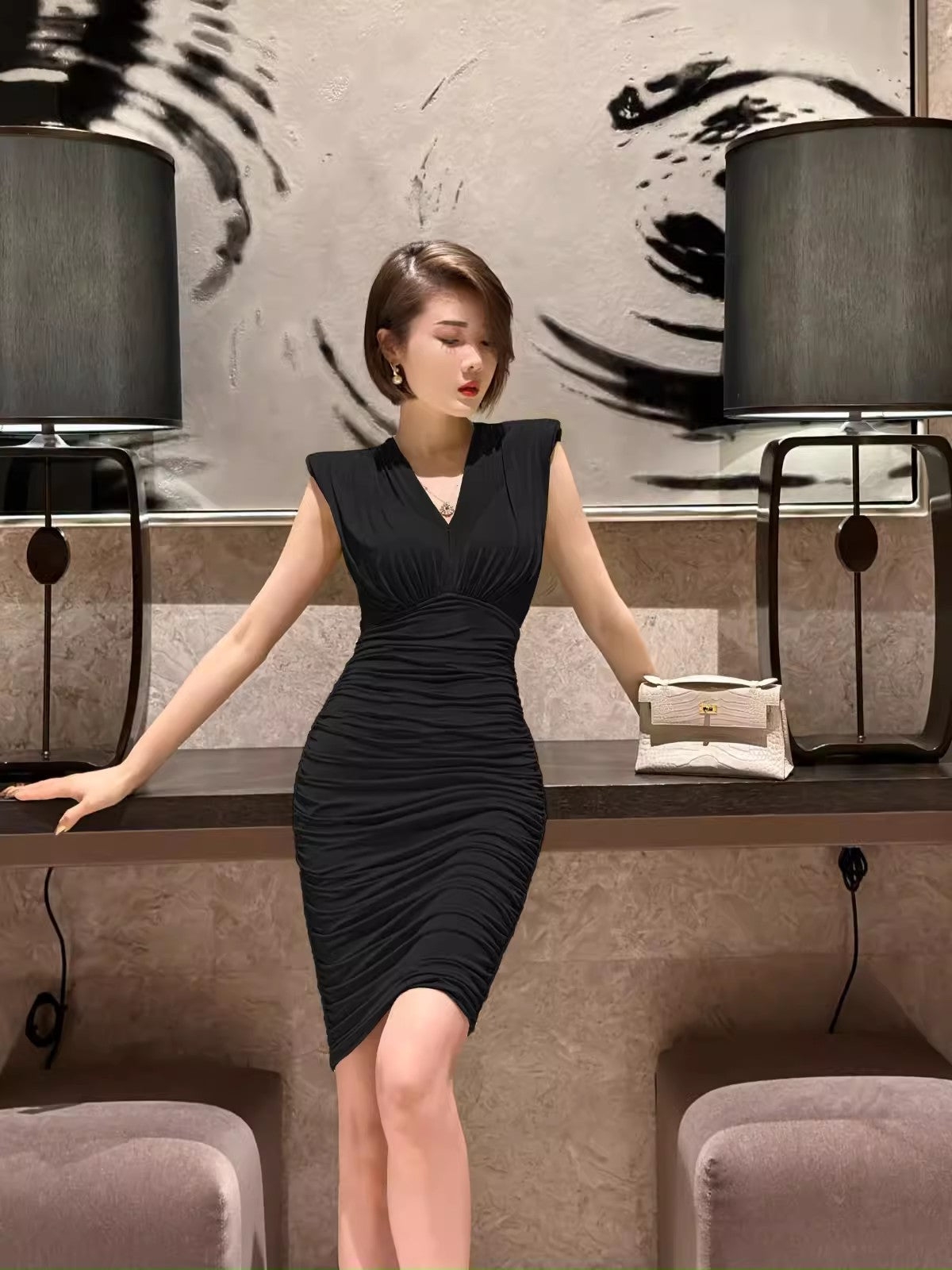 Black evening dress. Sleeveless dress.Short skirt.