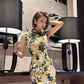 Yellow cheongsam. Floral short-sleeved cheongsam.