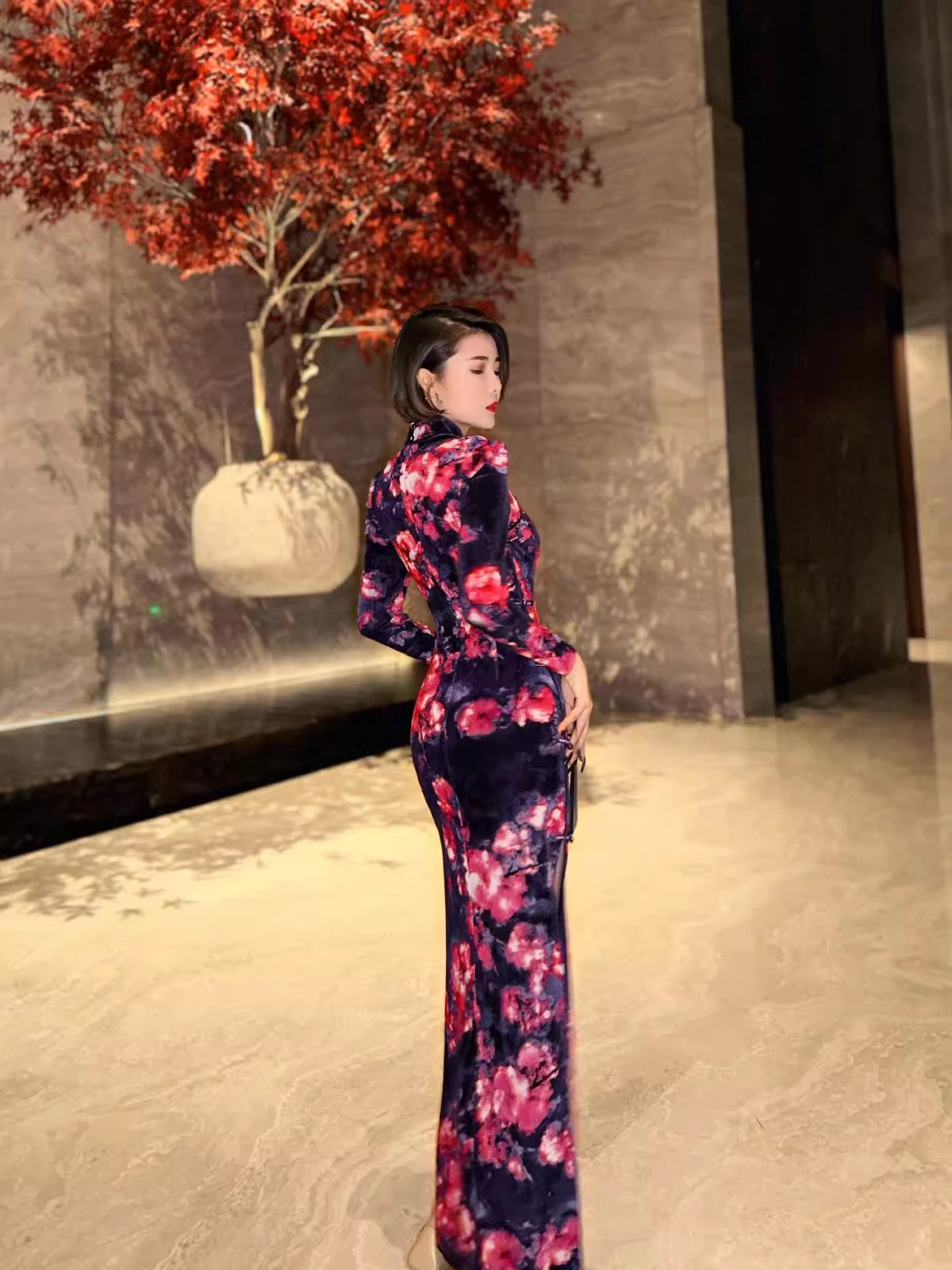 Black floral cheongsam. Long sleeve gown.