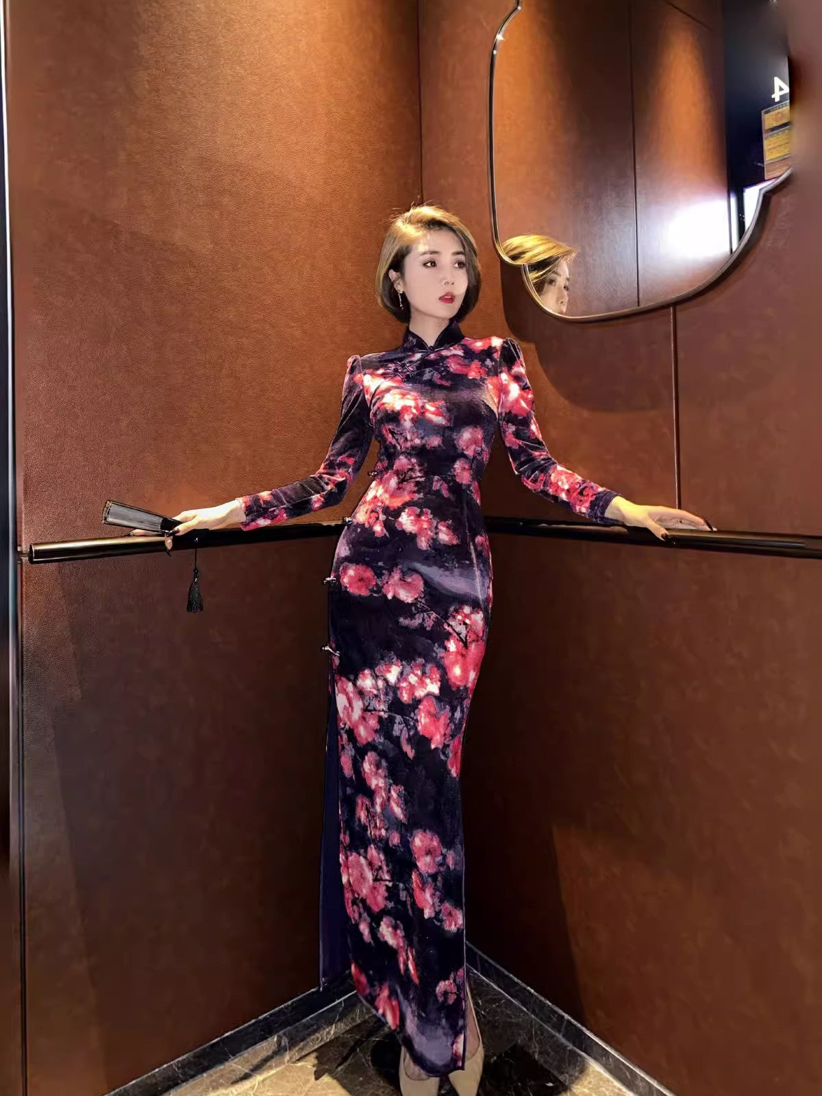 Black floral cheongsam. Long sleeve gown.