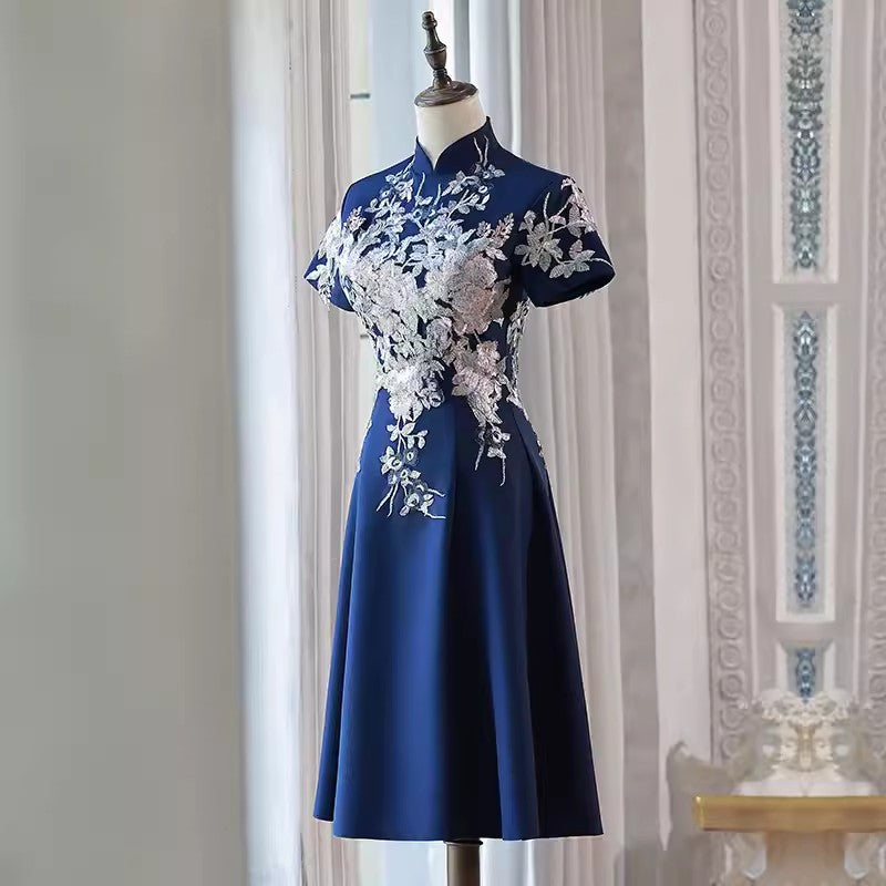 Blue embroidered cheongsam. Elegant ball gown.