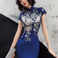 Blue embroidered cheongsam. Elegant ball gown.