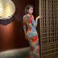 Floral cheongsam. Long sleeve maxi dress.