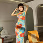 Floral cheongsam. Long skirt with short sleeves.