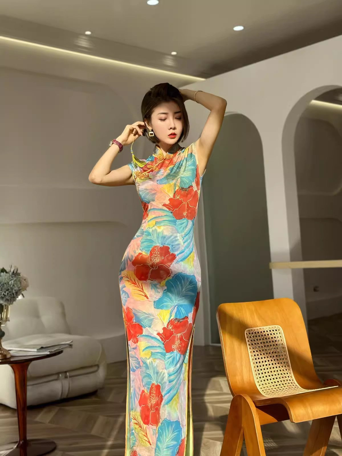 Floral cheongsam. Long skirt with short sleeves.