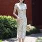 Green cheongsam. Short sleeve cheongsam. Green dress.