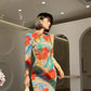 Floral cheongsam. Long sleeve maxi dress.