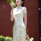 Green cheongsam. Short sleeve cheongsam. Green dress.