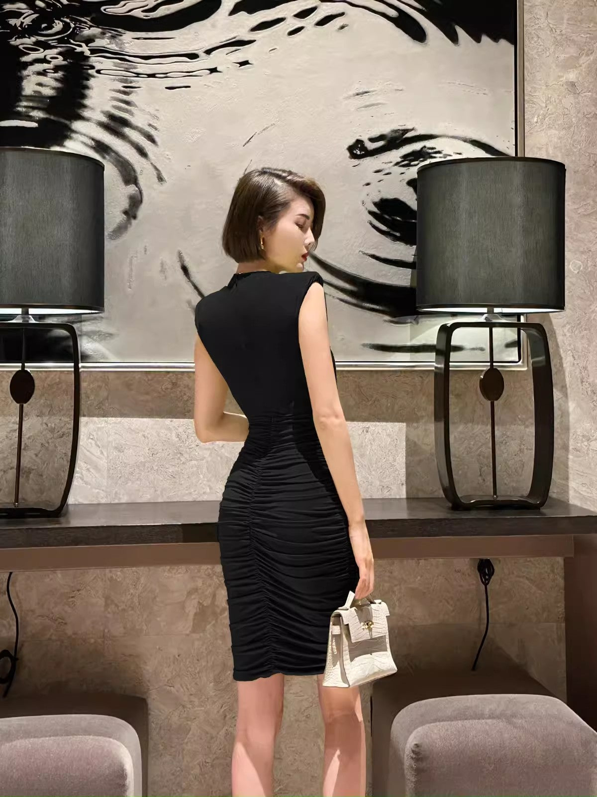 Black evening dress. Sleeveless dress.Short skirt.