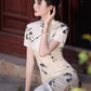 Traditional short-sleeved cheongsam. Floral cheongsam.