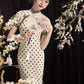 Polka dot cheongsam. Champagne color short-sleeved cheongsam.