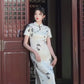 Traditional short-sleeved cheongsam. Floral cheongsam.