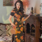 Elegant floral cheongsam. Chinese Qipao dress.