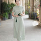 Green A-line cheongsam. Short sleeve cheongsam.