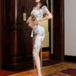 Traditional satin cheongsam. Blue full qipao. Silk and polyester textiles. Fully lined.