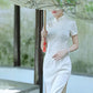 Traditional Chinese cheongsam dress. White cheongsam.