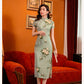 Green jacquard cheongsam. Knee qipao. Silk and polyester blend.